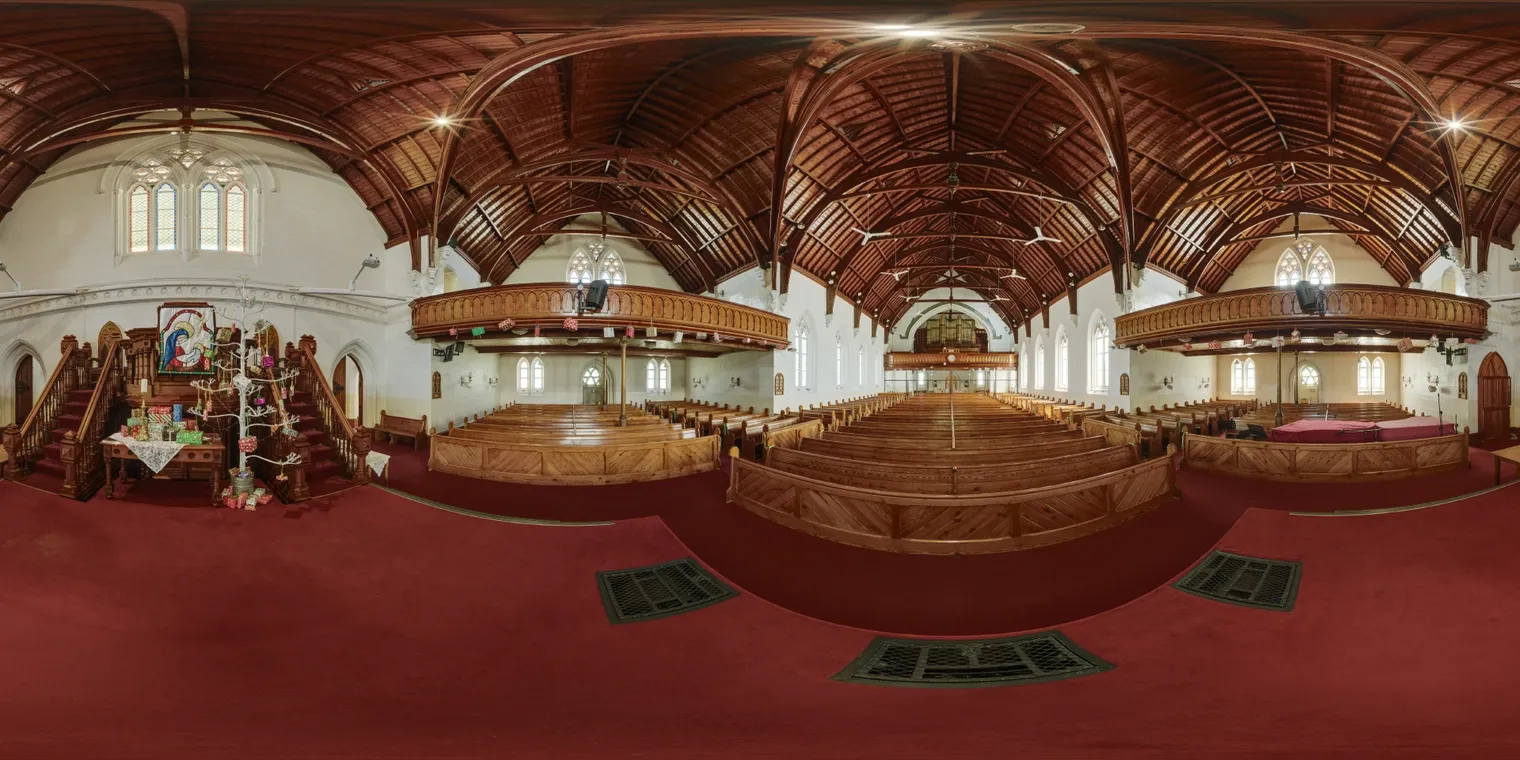 An equirectangular HDRI photograph of a church environment
